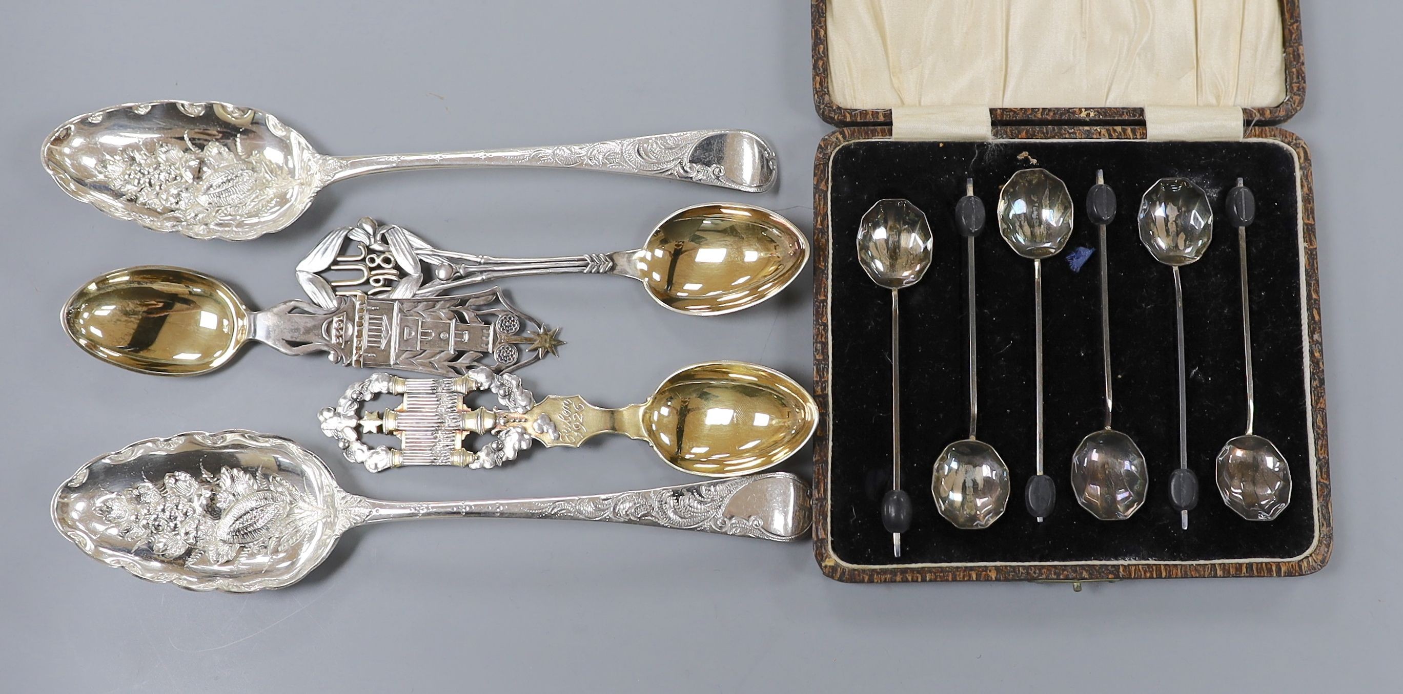 A pair of Victorian silver Old English pattern 'berry' spoons, London, 1837, three later Danish parcel gilt white metal commemorative spoons and a cased set of silver bean end coffee spoons